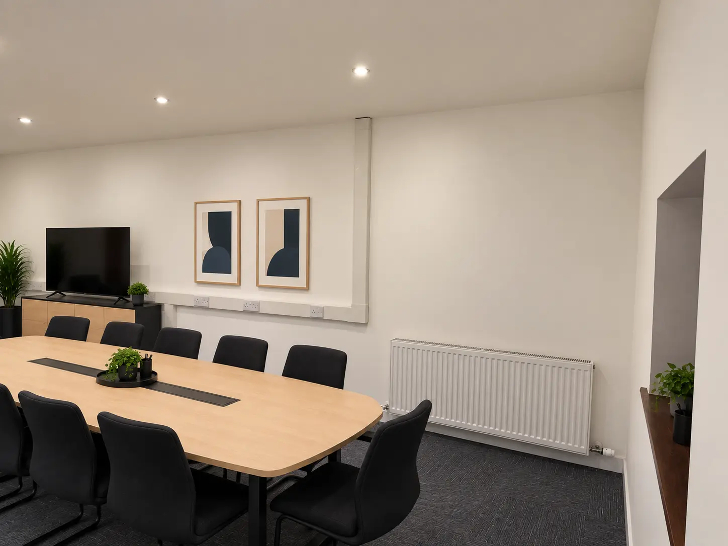 Side view across the River House boardroom table