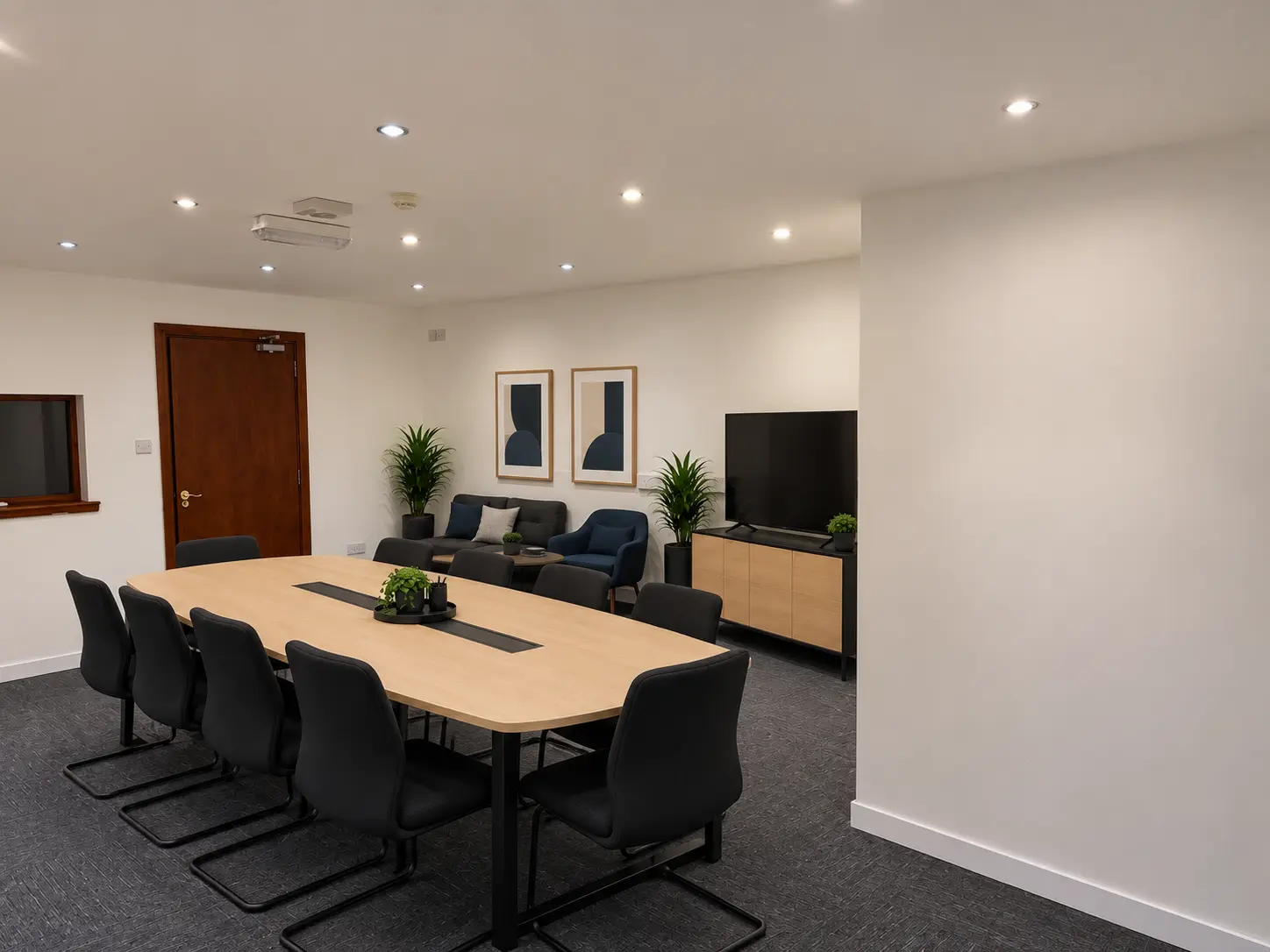 Wide view of the River House boardroom and lounge area